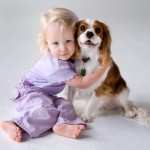 BFB animals blond toddler hugging dog