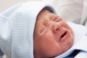 A Newborn Baby Boy Crying