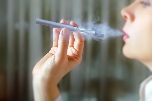 Closeup Portrait Of Female Smokers.