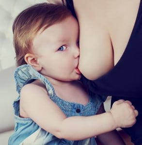 mother breastfeeding her one year old baby